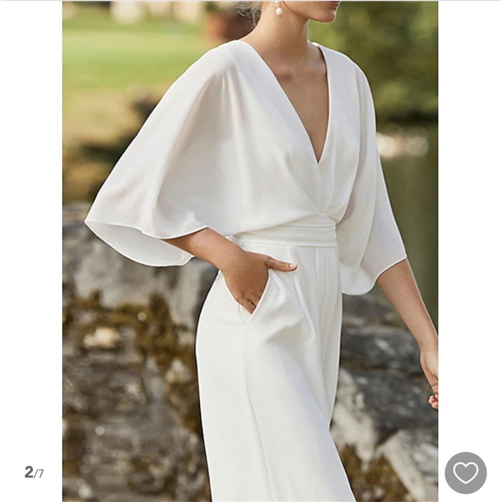 White jumpsuit with wide sleeves